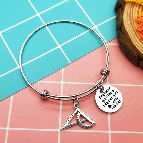 Funny Engineer Gift For Women Engineers Bracelet With Ruler Charm Expandable Bangle Boss Lady Vibe Mechanical Engineer Gift For Friend Graduation Celebration stainless steel bracelet with protractor charm on colorful background.