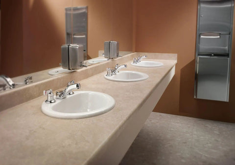 Commercial M Dura Widespread Lavatory Faucet 2.2 GPM Chrome Finish Solid Brass in public restroom sink setup