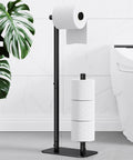 Free Standing Toilet Paper Holder With Four Roll Capacity, Rustproof Metal Stand, Non-Slip Stable Base, Black Finish in bathroom