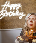 LED Neon Happy Birthday Sign Night Light For Party Backdrops And Bedroom Wall Decor, USB Powered White Glow, woman blowing candles