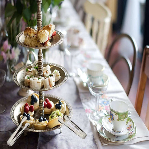 Tiered tray with desserts served alongside Six Piece Mini Ice Tongs Set 4.25 Inch Stainless Steel Tiny Serving Tongs at a tea party.