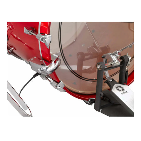 Tough as Nails Metal Body Acoustic Bass Drum Trigger With Die Cast Build Chrome Finish And Clean Lug Style For Pro Look Compact Footprint Soft Head Contact That Keeps Your Acoustic Sound Crisp Compatible With DTX900M DTX700 DTX502 And DT Series attached to red drum
