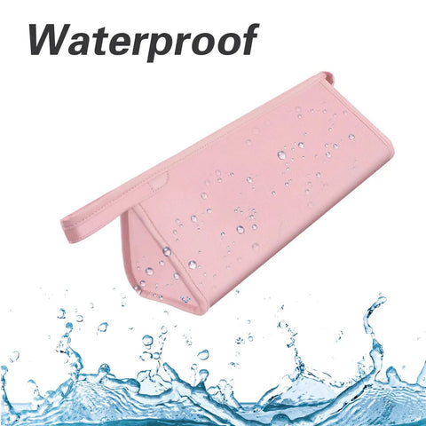 All In One Travel Case For Hair Gear Like Airwrap And Similar Dryers Waterproof Dustproof Shockproof Organizer With Dual Layer Storage Large Capacity Pink, showing waterproof feature with water droplets on pink surface.