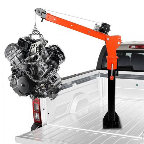 Solid As A Rock Folding Truck Bed Crane With 1100 Lb Capacity And 2000 Lb Electric Winch 12V 360 Swivel Alloy Steel Jib Hoist lifting an engine in a pickup truck bed.