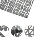 Close-up of interlocking cushion PVC flooring tiles set 12x12 inches no slip drainage mats with detail of modular tile system.