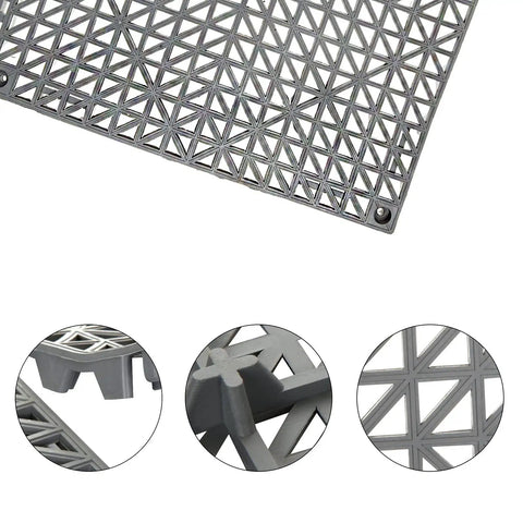 Close-up of interlocking cushion PVC flooring tiles set 12x12 inches no slip drainage mats with detail of modular tile system.