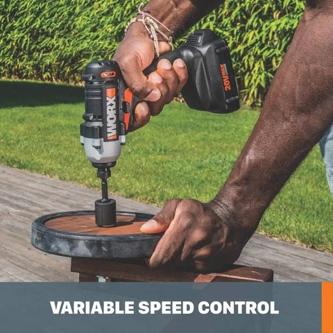 20V Power Share Brushless Impact Driver With Quick Release Quarter Inch Hex Chuck in use outdoors for DIY project