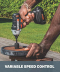 Compact 20V Cordless Impact Driver With LED Headlight Tiny But Mighty at 2.42 Lbs Design Power Share Compatible Fits Tight Spaces Low Battery Indicator Ideal for Pros and DIY Projects in use on wooden surface