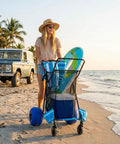Heavy Duty Folding Beach Cart With Balloon Wheels Ocean Utility Carrier For The Sand on a sunny beach with accessories