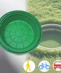 Built Tough Invisible Manhole Cover For Outdoor Use, durable resin lid for lawn and garden drainage, showing top view