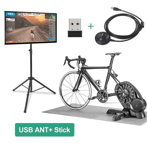 Indoor cycling setup with Ant Plus USB Dongle, bike on trainer, screen displaying cycling stats, and data cables.