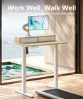 Compact Electric Standing Desk With Two Drawers 32x21 Inch Workstation C Clamp Mount Compatible in light walnut finish