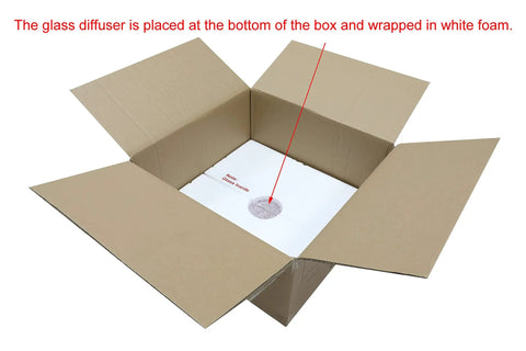 Glass diffuser for Dark Bronze 18 Inch 3 Light Drum Pendant with Fabric Shade and Glass Diffuser in a shipping box.