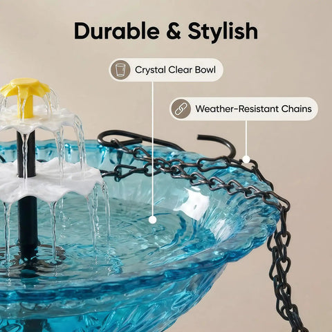 Close-up of solar bird bath fountain with hanging cascade water bowl and pump, featuring blue crystal clear bowl and weather-resistant chains.