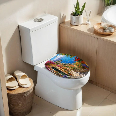 Elongated Mediterranean Coastal Village Colorful Flowers Toilet Seat on a white toilet with a modern bathroom setting.