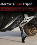 Side view of Adjustable Aluminum Triangle Motorcycle Kickstand installed on bike, showcasing heavy-duty black aluminum alloy design.