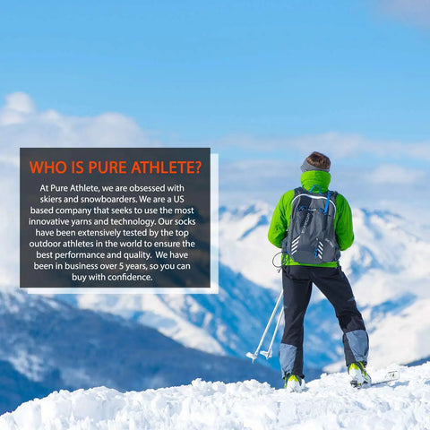 Skier in green jacket on snowy mountain, highlighting Elite Wool Race Ski Socks For Cold Weather Skiing And Snowboarding, Comfy And Breathable.
