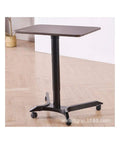 Built Different Overbed Table With Adjustable Height For Bedside Care And Work From Home Vibes Smooth Locking Casters, black and brown finish on rolling base.