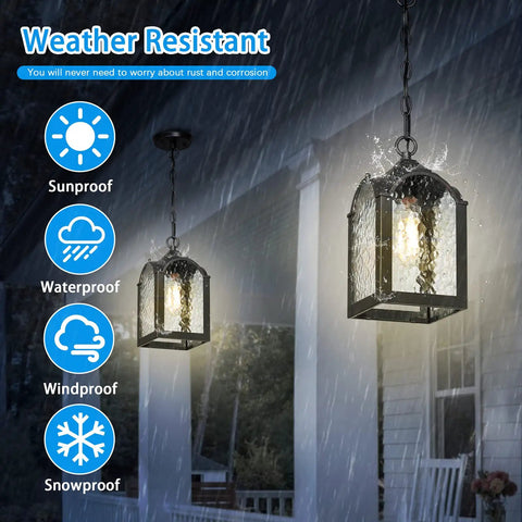 Waterproof Outdoor Pendant Light With Adjustable Chain in Black Finish illuminating a porch in rain, modern farmhouse style