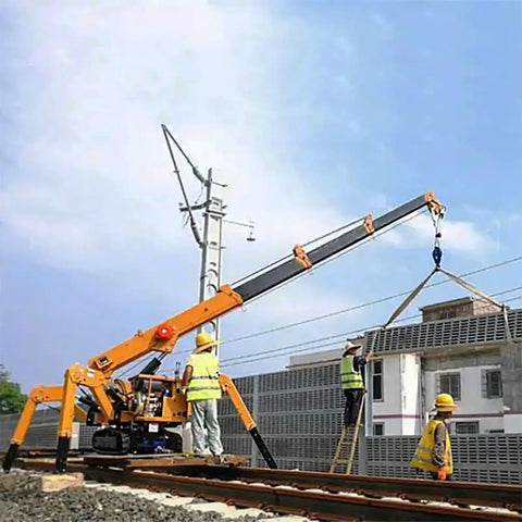 Mini Portable Crawler Crane Rig With Smart Wireless Remote Hydraulic Lift Machine Fully Kitted Out lifting materials at a construction site.