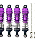 Oil Filled Metal RC Shock Absorber Upgrade Kit For 1 14 Scale WLtoys Buggy 144001 124018 124019 Suspension Replacement Parts Four Piece Set In Purple For Smoother Travel And Better Handling, showing four purple shock absorbers with screws.