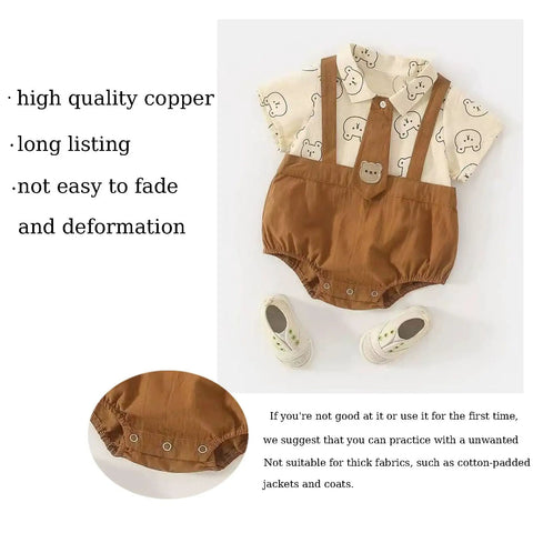 Dope Snap Button Kit with 100 sets metal snaps and fastener pliers press tool attached to brown baby romper with bear print detail.