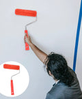 Decorative Texture Roller With Handle for Faux Wood Wall Finish Painting in use, applying textured design on wall