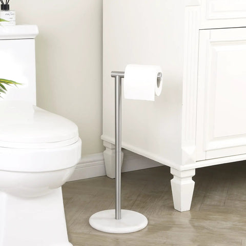 Freestanding Toilet Paper Holder With Unique Marble Base Modern Brushed Stainless Steel Stand next to a bathroom vanity