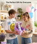 Celebrating the gift of a 32 Oz Smart Water Bottle Hydration Tracker With Gentle Drink Alarms And Heavy Duty Insulation in a colorful box.
