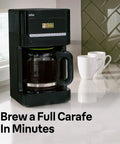 Quality Morning Coffee Made Easy With This Twelve Cup Programmable Drip Coffee Maker in Black on countertop with mugs.