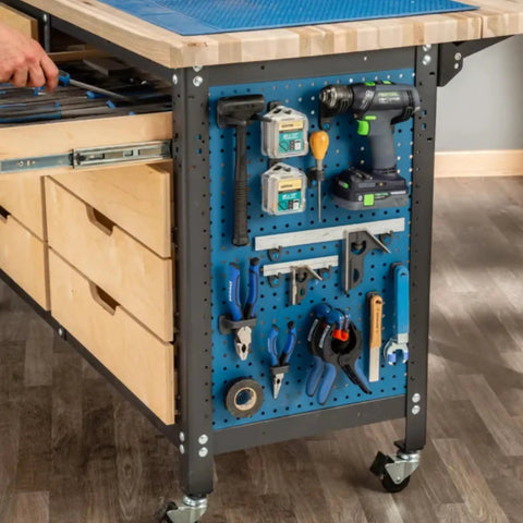 Blue pegboard with assorted tools on workbench, featuring Hang Tight Pegboard Hooks Kit With Locking Design 32-Piece Tool Organizer Set.