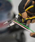 Worker cutting THHN 10 AWG Copper Wire Red 100 Ft Roll Indoor Outdoor 600V Rated For Branch Feeder And Service Power Distribution