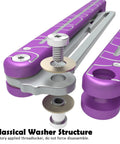 Close-up of Lightning Washer System Butterfly Balisong Trainer with purple 6061 aluminum handle and washer structure.