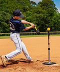 Youth practicing swing with Patented Swing Trainer With 12 Soft Training Balls For Baseball And Softball Build Speed Stay Connected