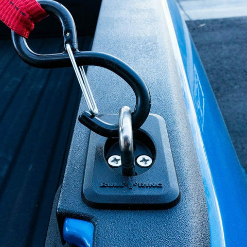 Retractable Truck Bed Tie Down Anchors 2-Pack With Raised Fit OE Texture Top Rail Mount. Installed on blue truck rail