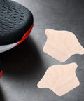 Game Changing Heel Grips And Liner Cushions To Tighten Up Loose Shoes Anti Chafing Beige Shoe Inserts displayed with a sneaker