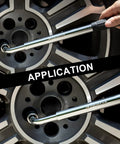 Telescoping 4 Way Lug Wrench Extendable Half Inch Drive With 17 19mm And 21 23mm Sockets in use on car wheel