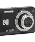 A Real Deal 16 Megapixel Digital Camera With 5X Optical Zoom resting on a surface, showcasing its sleek design and lens.