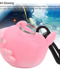 Glow In The Dark Diving Mouthpiece Cover For Night Dives Dust Proof Second Stage Regulator Holder Pink Durable Plastic Build That Resists Corrosion And Extreme Pressure For Extended Underwater Adventures; pink mouthpiece cover on rocky underwater background with diver