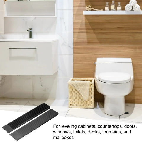 24 Pack Composite Leveling Shims And Wedges, 7.87 Inch Black Plastic Shims beside a toilet for leveling and stability
