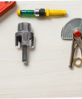 Kichouse 3-Piece Pvc Pipe Threading Kit With Internal And External Thread Cutter Tools compatible with electric drill on wooden surface.