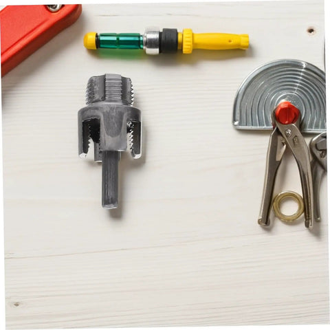 Kichouse 3-Piece Pvc Pipe Threading Kit With Internal And External Thread Cutter Tools compatible with electric drill on wooden surface.