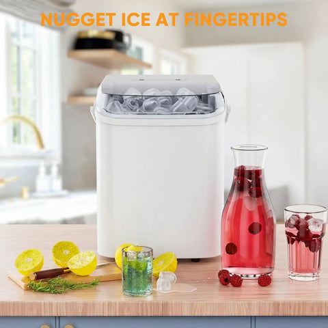 Grab And Go Countertop Ice Maker With Handle Portable Ice Machine Delivers Ice In Six Minutes, Nine Bullet Ice Cubes Per Batch With Basket And Scoop, Produces About 26 Lbs Per Day, Auto Cleaning, Perfect For Home Kitchen RV Camping White on kitchen counter with drinks and lemons