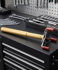 Ergonomic Smoke Transducer Removal Tool With 11 Point 8 Inch Extension Handle on a workbench, showcasing steel claw head and red grips.