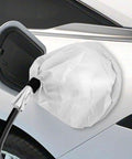 Heavy Duty Transparent EV Charger Port Cover With Slick Magnetic Closure No Sweat All Weather Shield Against Rain Snow UV Poly Fabric Protector For Electric Vehicles mounted on a charging port.