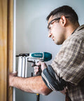 Person using Renewed 18 Gauge Pneumatic Brad Nailer For DIY Pros, Drives Nails From Five Eighths To Two Inches, in action