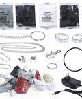 Electric Gemstone Tumbler Polisher kit contents including rocks, polishing powders, polishing rings, and power adapter.