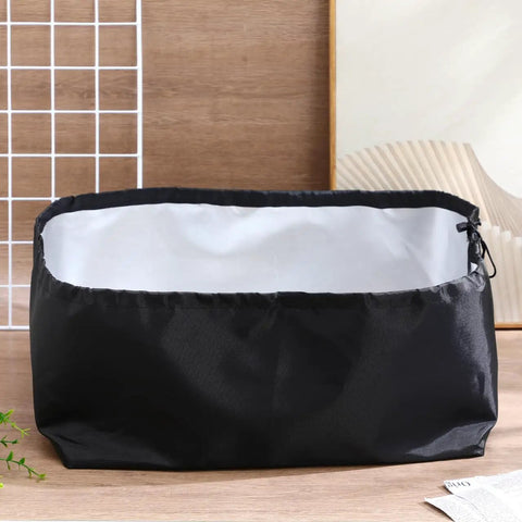 Top Shelf Outdoor Electric Vehicle Charger Cover Built Different With Heavy Duty Waterproof Cloth Shield For Tesla Wall Connector Level Two Port Guard Keeps Your Charge Cable Dry During Slick Rain Mess, black waterproof cover in rectangular shape.