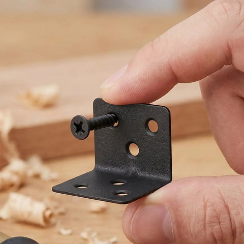 Hand holding 12 Pack L Shaped Corner Brackets With Screws For Shelves And Cabinets 90 Degree Right Angle Shelf Braces Built Beefy From Cold Rolled Steel