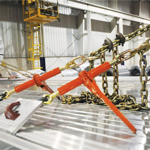 Beefy Ratchet Style Load Binder With Two Grab Hooks 7100 Lb Safe Working Load Fits 5/16 Or 3/8 Inch Chain in use on industrial site